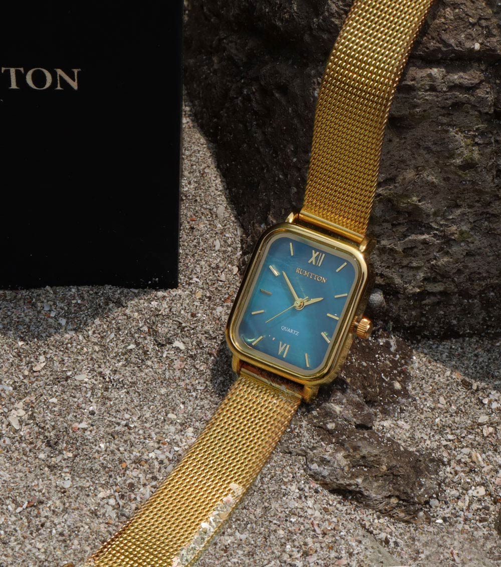 Mesh hot sale gold watch